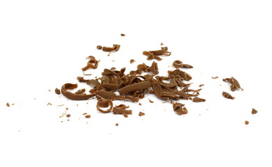 Grated chocolate. Heap of ground chocolate isolated on white background with clipping path, closeup.
