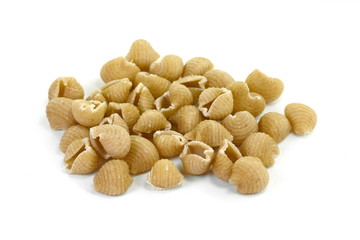 Wholemeal pasta on a white background 