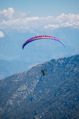 Paragliding on the mountains. Extreme sport. Landscape