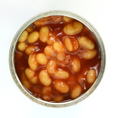 Tinnes beans top view on white. Open can of beans on a white background. Baked Beans - Baked beans in tomato sauce.