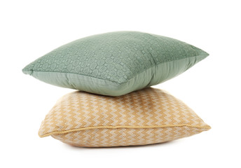 Soft pillows on white background
