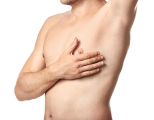 Naked young man after epilation on white background