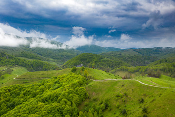 Fototapeta premium Green meadows of Transylvania in the spring.