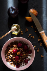 Breakfast with granola, cherry and honey.healthy breakfast Proper nutrition.