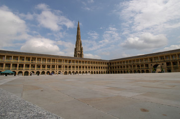 Halifax West Yorkshire UK, 10th May 2019: Photo of the famous Piece Hall in the Blackledge area of Halifax, showing the historic stone build building, taken on a part cloudy sunny day. - obrazy, fototapety, plakaty