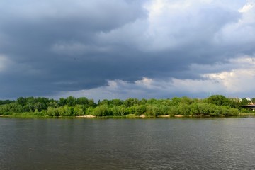 Fototapeta premium Dark storm clouds over the Vistula river, Warsaw, Poland