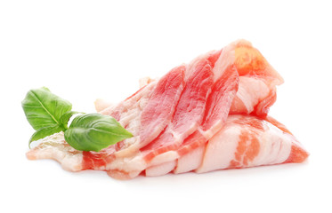 Raw bacon strips on white background