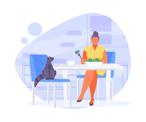 Girl with a cat in the kitchen