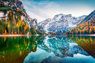 First snow on Braies Lake. Colorful autumn landscape in Italian Alps, Naturpark Fanes-Sennes-Prags,...