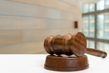 Wooden gavel on table close up. Justice concept
