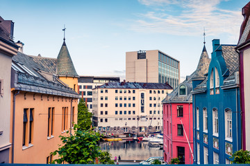 Great view of street of Alesund town on the west coast of Norway, at the entrance to the Geirangerfjord. Colorful morning cityscape. Traveling concept background. © Andrew Mayovskyy