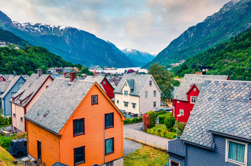 Typical Norwagian architecture in Odda town, Hordaland county, Norway. Beautiful summer view of Hardangerfjord fjord. Traveling concept background.