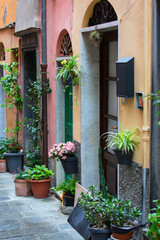 Fototapeta na wymiar View on narrow street in the city, Porto Venere, Italy