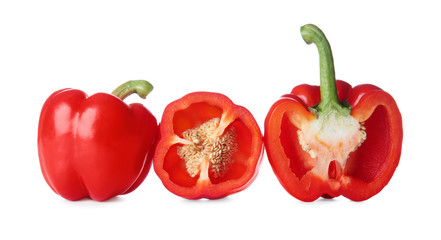 Ripe red peppers on white background