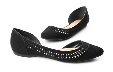 Pair of stylish female shoes on white background