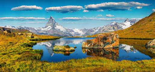 Colorful summer panorama of the Stellisee lake. Great outdoor scene with Matterhorn (Monte Cervino,...