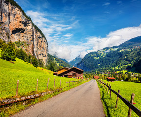 Splendid summer view of waterfall in Lauterbrunnen village. Splendid outdoor scene in Swiss Alps,...