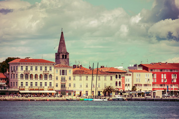 Retro style morning cityscape of popular summer resort Porec. Bright spring seascape of Adriatic Sea. Great  scene of Istrian Peninsula in western Croatia, Europe. Traveling concept background.