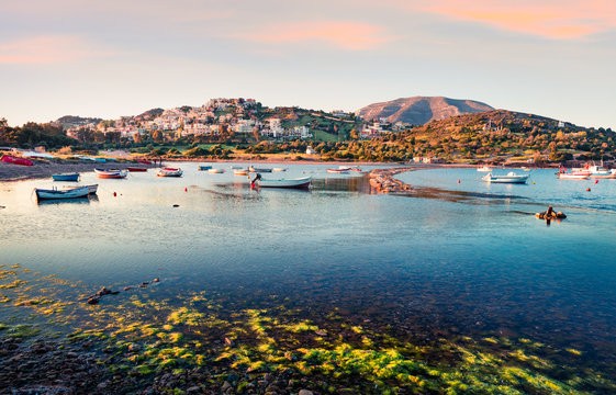 Spectacular spring scene of the Nuevo Loca Beach, Aegean sea. Wonderful evening view of the Anavyssos town, Greece, Europe. Traveling concept background.