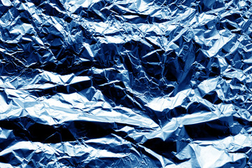 Metal foil texture in navy blue color.