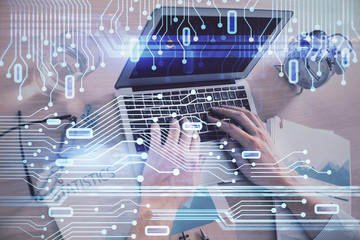 Businessman with computer background with technology theme hologram. Concept of big data. Double exposure.