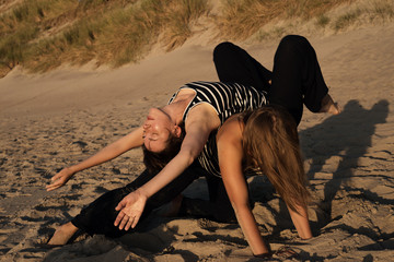 Women dance dance contact improvisation in nature