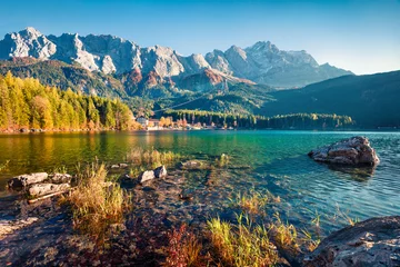 Foto op Aluminium Marvelous evening scene of Eibsee lake with Zugspitze mountain range on background. Exciting autumn view of Bavarian Alps, Germany, Europe. Beauty of nature concept background. © Andrew Mayovskyy