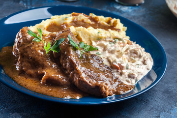 Stewed pork neck with potatoes and sauce