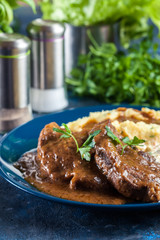 Stewed pork neck with potatoes and sauce