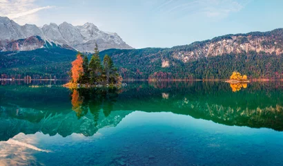 Papier peint photo Le salon Spectacular morning scene of Eibsee lake with Zugspitze mountain range on background. Colorful autumn view of Bavarian Alps, Germany, Europe. Beauty of nature concept background.  © Andrew Mayovskyy