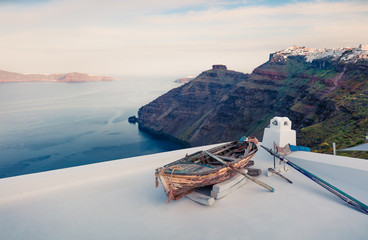 Bright morning view of Santorini island. Picturesque spring scene of the  famous Greek resort - Fira, Greece, Europe. Traveling concept background.