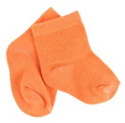 Orange baby socks isolated on white