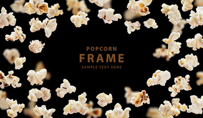 Popcorn frame, flying popcorn isolated on black background with copy space, movie poster concept - obrazy, fototapety, plakaty