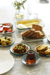 Turkish breakfast with various plates on a table