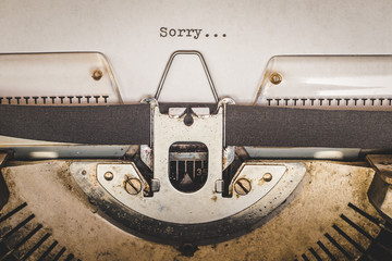 sorry message on vintage typewriter