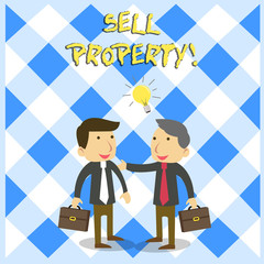 Handwriting text Sell Property. Conceptual photo Accepting an offer of money in return for the property Two White Businessmen Colleagues with Brief Cases Sharing Idea Solution