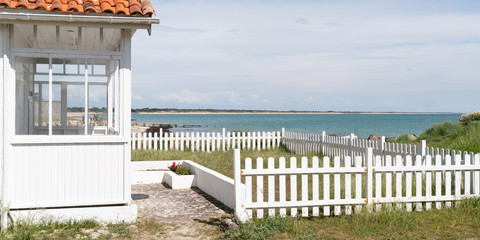 white beach house front of arcachon Bassin in cap ferret in France in web banner template