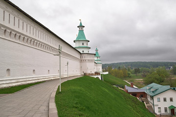 View of the white stone wall with towers New Jerusalem monastery in Istra, Moscow oblast, Russia
