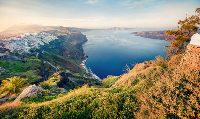 Fabulous morning scene of Santorini island. Great spring view of the famous Greek resort Fira, Greece, Europe. Traveling concept background. Artistic style post processed photo.
