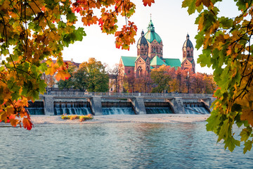 Splendid autumn view of Landmark Protestant St. Luke's Church. Bright morning cityscape of Munich,...