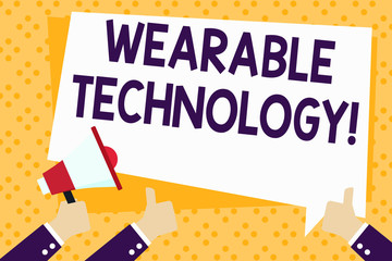 Writing note showing Wearable Technology. Business concept for electronic devices that can be worn as accessories Hand Holding Megaphone and Gesturing Thumbs Up Text Balloon