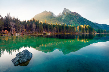 Fantastic autumn sunrise of Hintersee lake. Amazing morning view of Bavarian Alps on the Austrian...