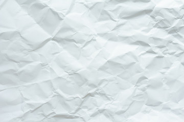 White crumpled paper texture background.