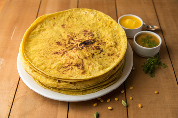 Holi festival, Traditional Maharashtrian food on the occasion of Holi. Puranpoli made of Jaggery. And cold drink made of curd.