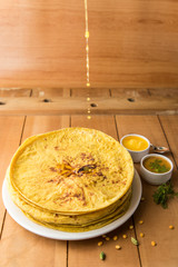 Holi festival, Traditional Maharashtrian food on the occasion of Holi. Puranpoli made of Jaggery. And cold drink made of curd.