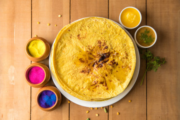 Holi festival, Traditional Maharashtrian food on the occasion of Holi. Puranpoli made of Jaggery. And cold drink made of curd.