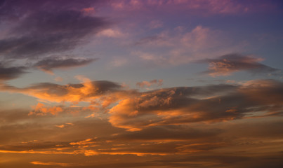 Obraz premium Beautiful colorful sky with clouds and sunlight. Color toned.