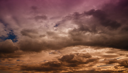 Fototapeta premium Beautiful colorful sky with clouds and sunlight. Color toned.