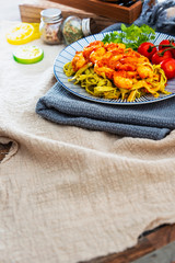 Small Gambas, stewed tomatoes, Tagliatelle with pesto