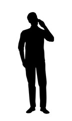 Silhouette of a man talking on the phone.